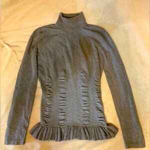 Brown turtleneck sweater. Fashionable runching. Fitted. Womens.